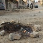 En el sitio donde ocurrió el crimen, los moradores dejaron una vela dentro de un círculo formado por rocas.