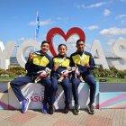 La gloria deportiva en una foto: David Hurtado, Glenda Morejón y Daniel Pintado.