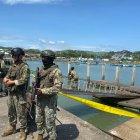 Uniformados están investigando sobre la masacre en el puerto pesquero.