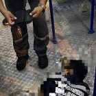 La víctima presentaba heridas de bala en el abdomen y la espalda.