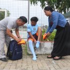 María Olga Huailla, su hijo José Miguel y su  esposo Segundo, una familia unida por el fútbol indígena.