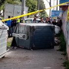 El cadáver de un indigente fue hallado dentro de un contenedor de basura en Quito.
