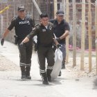 Personal de Criminalística realizó el levantamiento de los cuerpos.