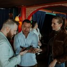 Noboa y Valbonesi junto al conferencista Daniel Habif.